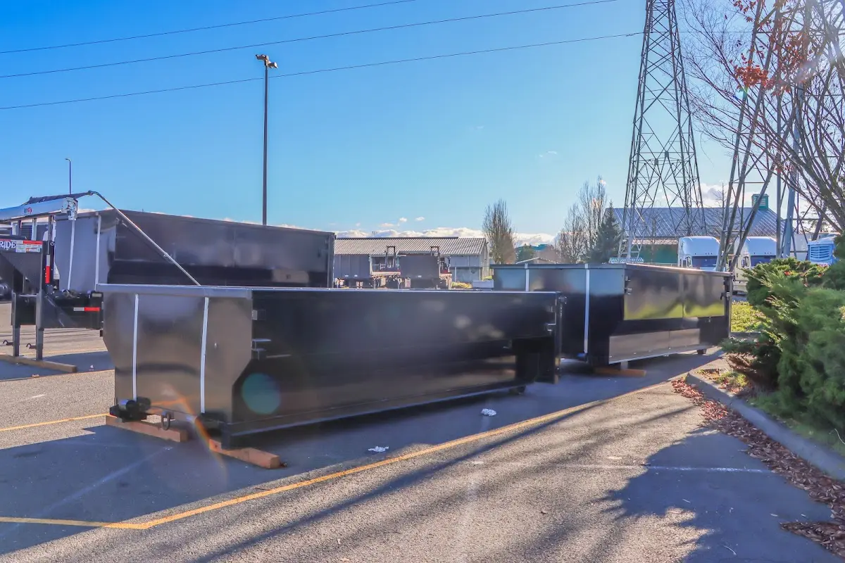Roll-off dumpster ready for waste disposal at job site for Construction Dumpster Rental in Elkins